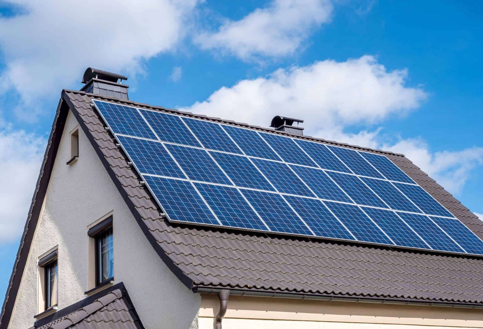 Services white-home-scallop-roof-and-solar-panels-shutterstock-1336991930-scaled-1-scaled